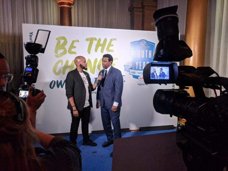 Behind the scenes shot of Denzel's interview from a secondary angle